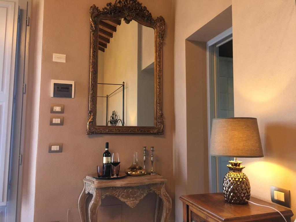 Deluxe Queen Suite - Cordella in Val d'Orcia Truffle and Olive Oil Resort, eleganza, comfort e dettagli creano un'esperienza indimenticabile.